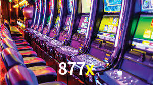 877x
